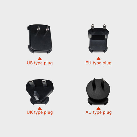 Universal AC adapter with 4 changeable plugs (US/EU/UK/AU)