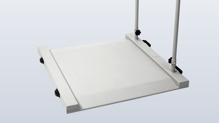 Low-profile wheelchair scale platform with smooth ramp access for easy patient transfers