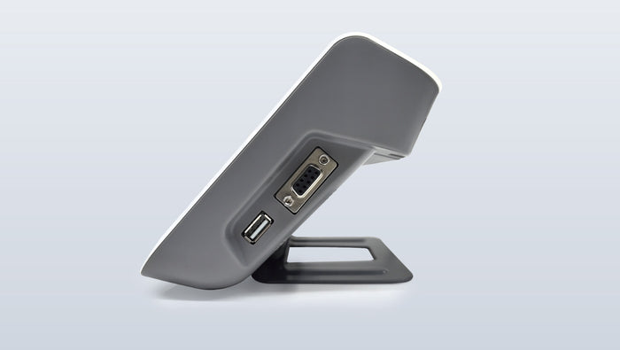 Versatile digital indicator mounted on wall and placed on table for flexible medical use
