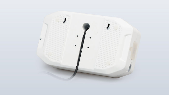 Versatile digital indicator mounted on wall and placed on table for flexible medical use