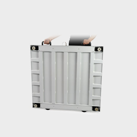 Heavy-duty wheelchair scale with adjustable anti-skid feet and transport castors